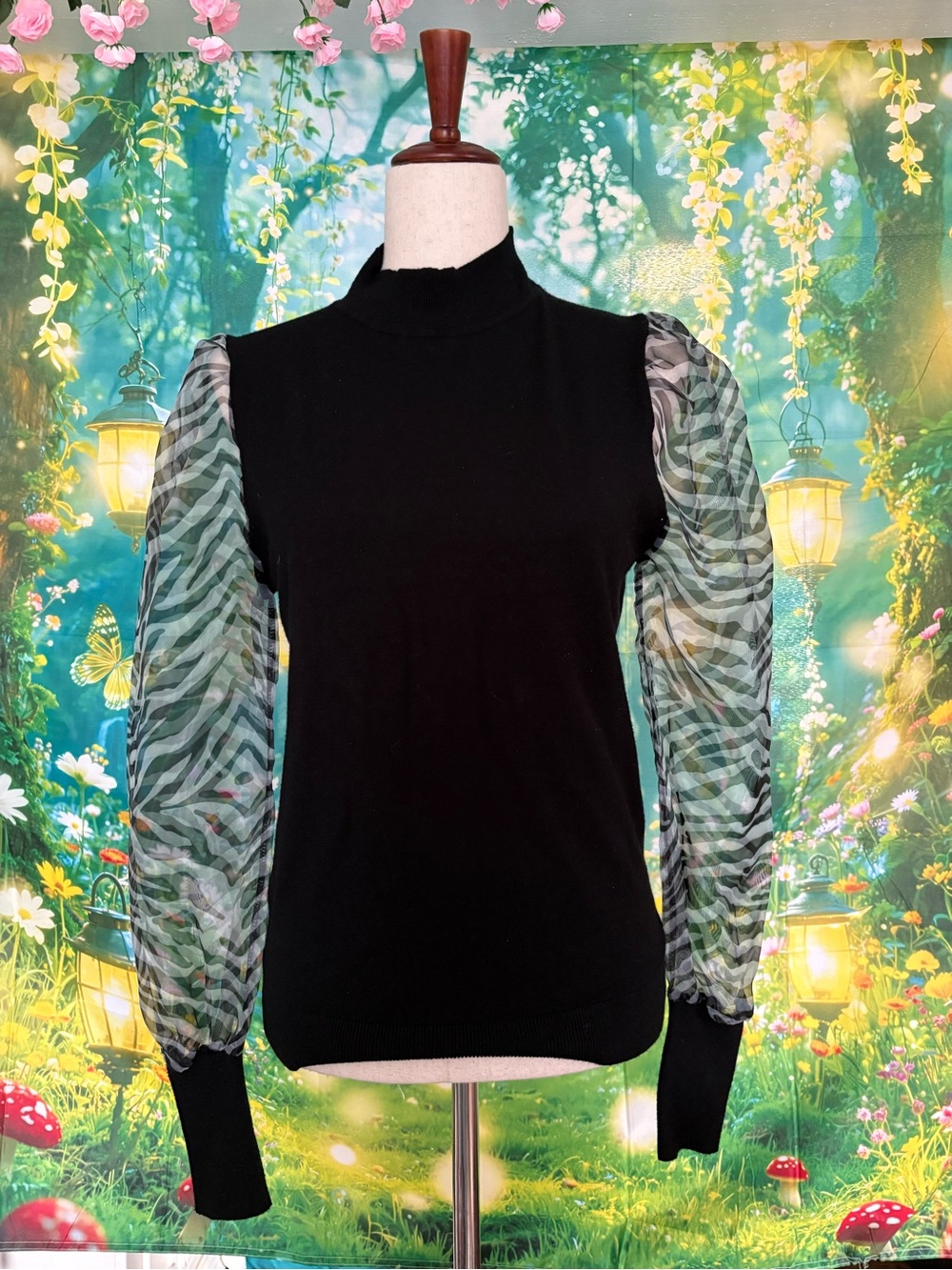 Sioni Black Mock Neck Sweater with Sheer Zebra-Print Puff Sleeves